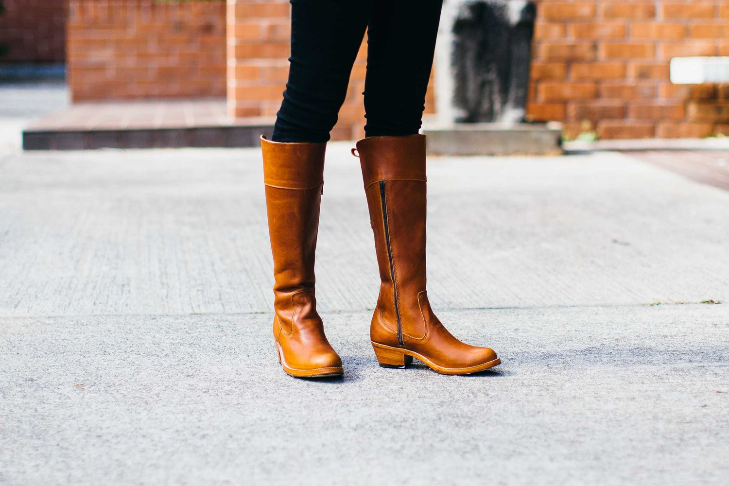 Handcrafted women's tan leather knee-high boots with side zipper detailing from the Adelante Made-to-Order Tall Boots Collection.
